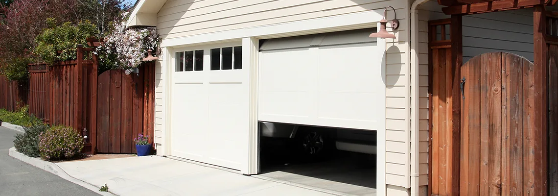 Fix Metal Garage Door Jerking in McHenry, Illinois